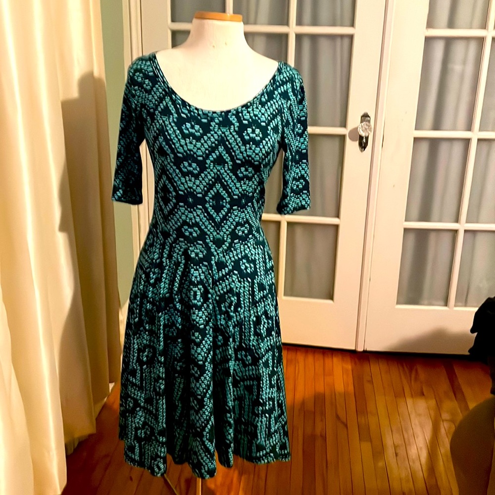 LuLaRoe Nicole Skater Dress Fit & Flare size Medium. Green with pattern.
